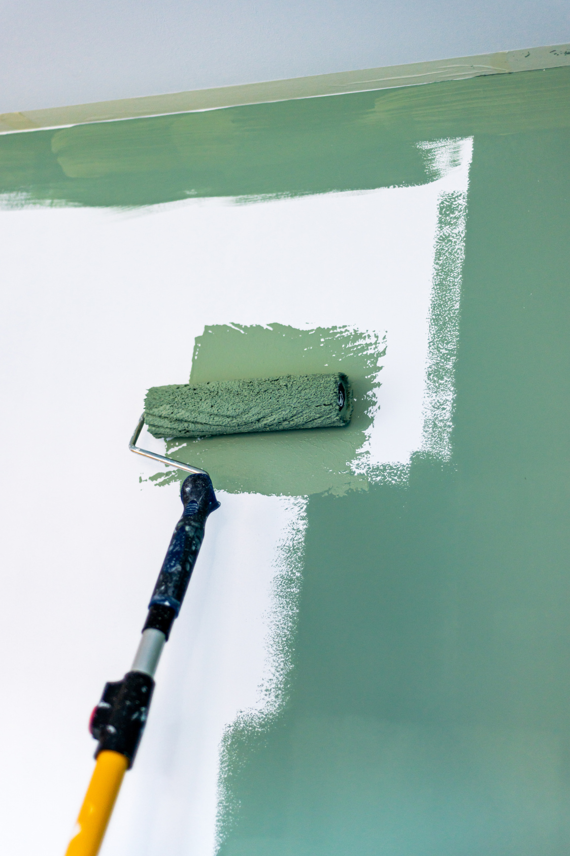 Paiting the Wall with Green Paint